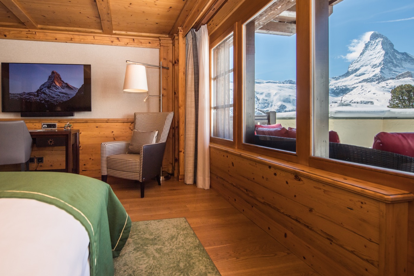 Riffelalp Resort room with wood interiors and Matterhorn view